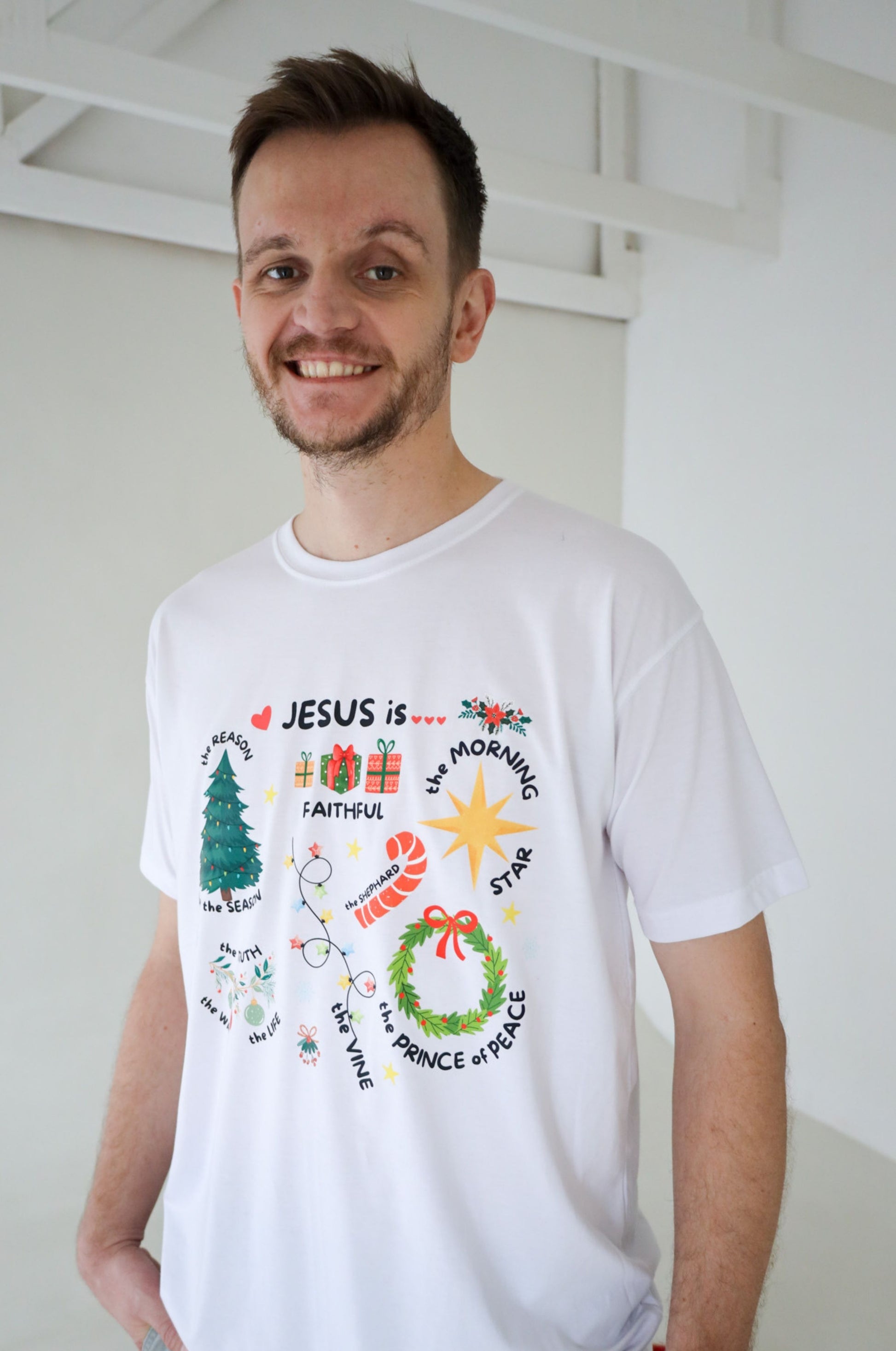 Man wearing white Christmas graphic t-shirt with Jesus design, 100% cotton Christian tee South Africa