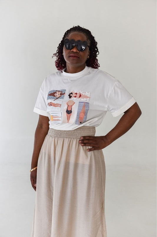Woman wearing white t-shirt with beach body illustration diverse body shapes graphic South Africa