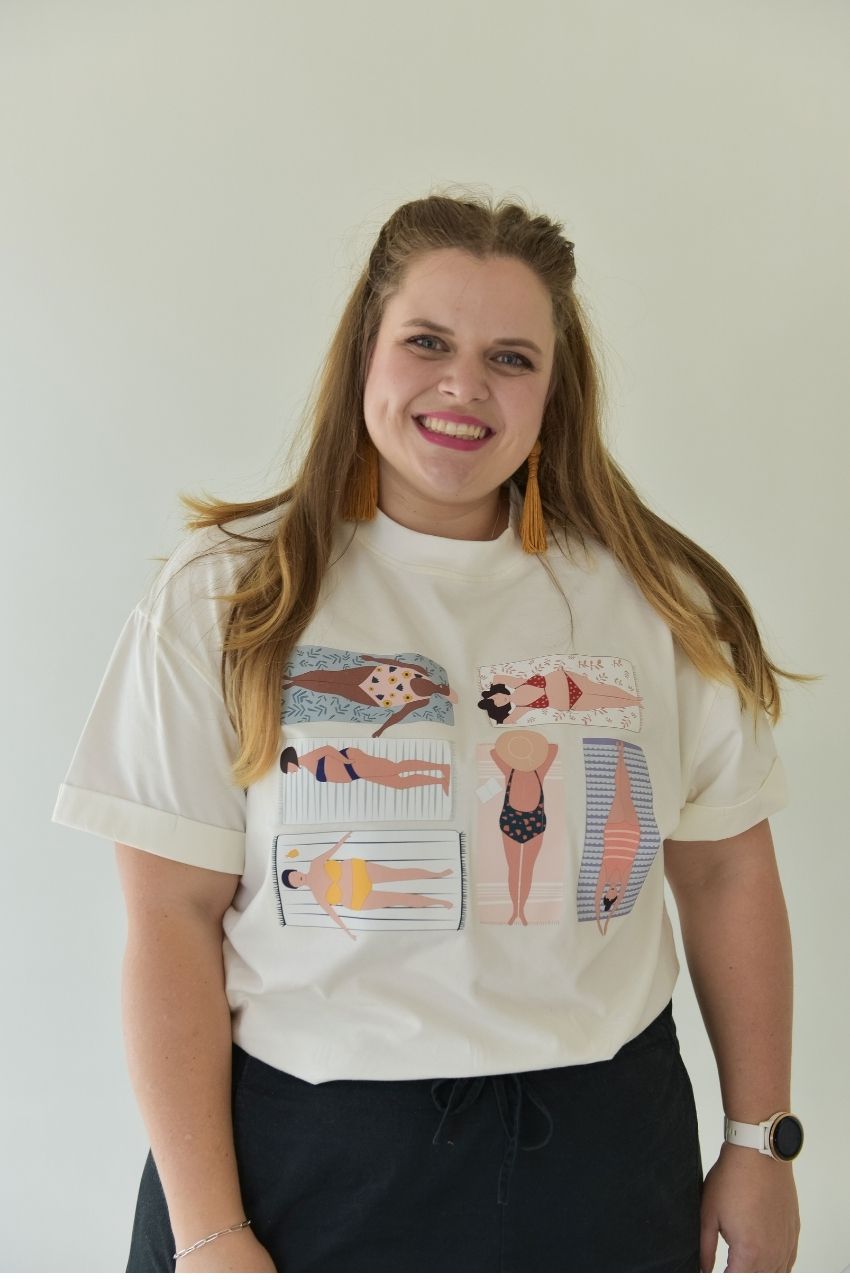 Close up of white t-shirt with illustrated women in swimwear body positivity design South Africa
