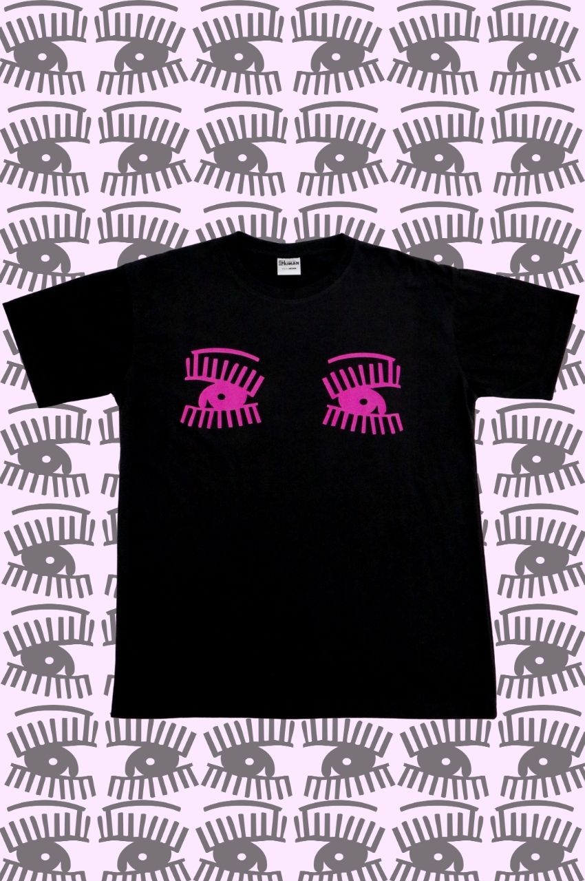 Black t-shirt with bold pink eye illustration graphic repeated pattern background