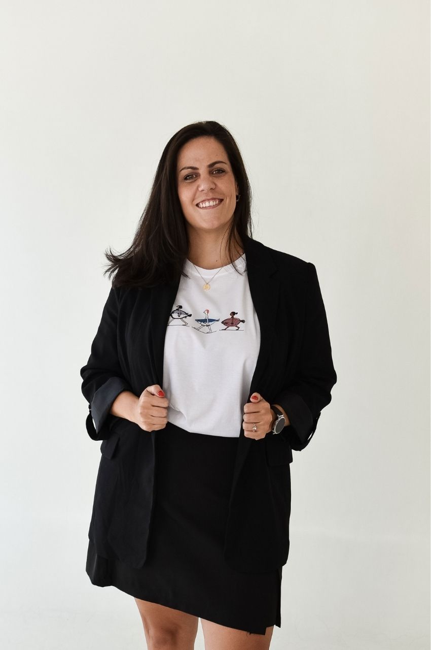 White fish graphic t-shirt styled with blazer and skirt smart casual outfit South Africa