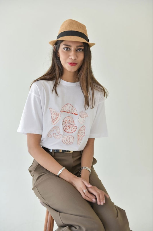 Woman wearing white t-shirt with minimal food illustration graphic casual fashion South Africa