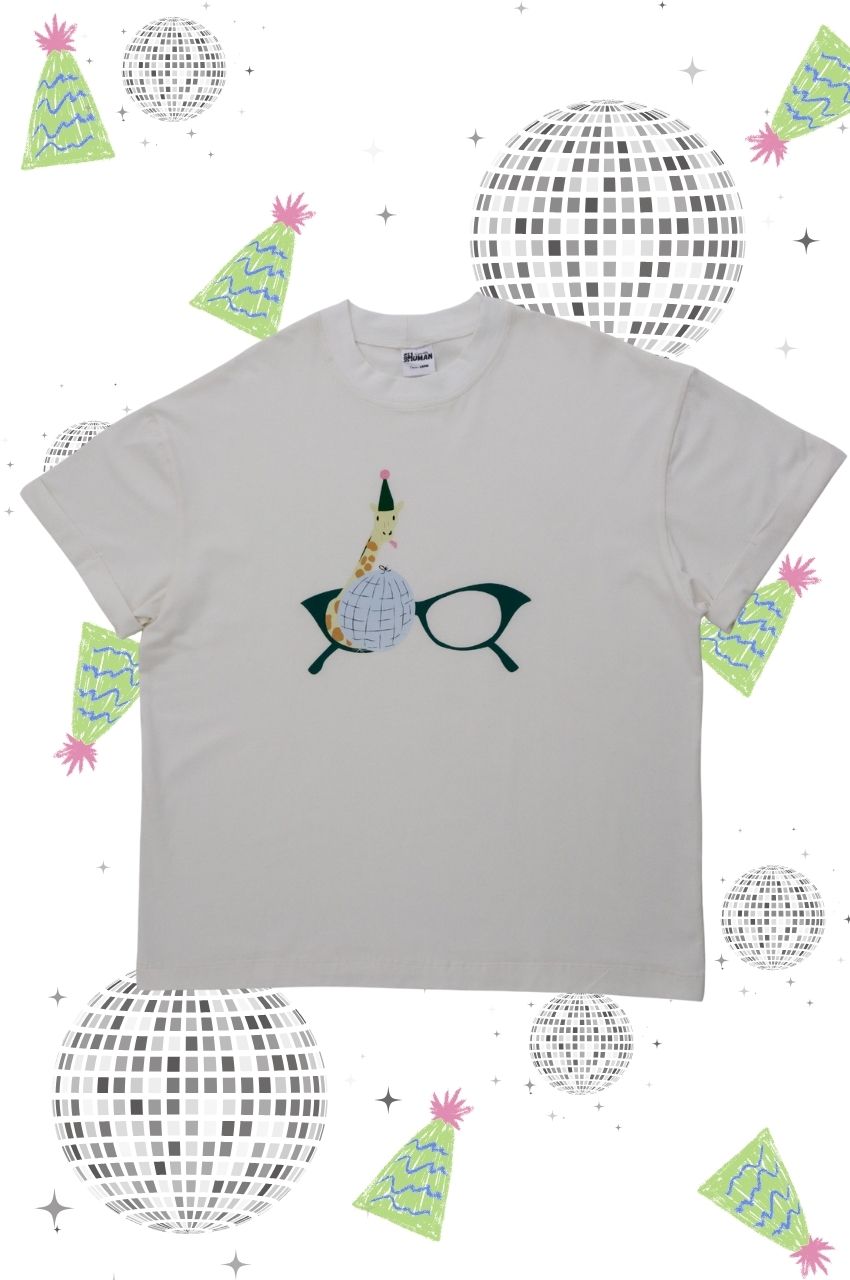 White t-shirt with giraffe holding disco ball wearing party hat quirky graphic tee South Africa