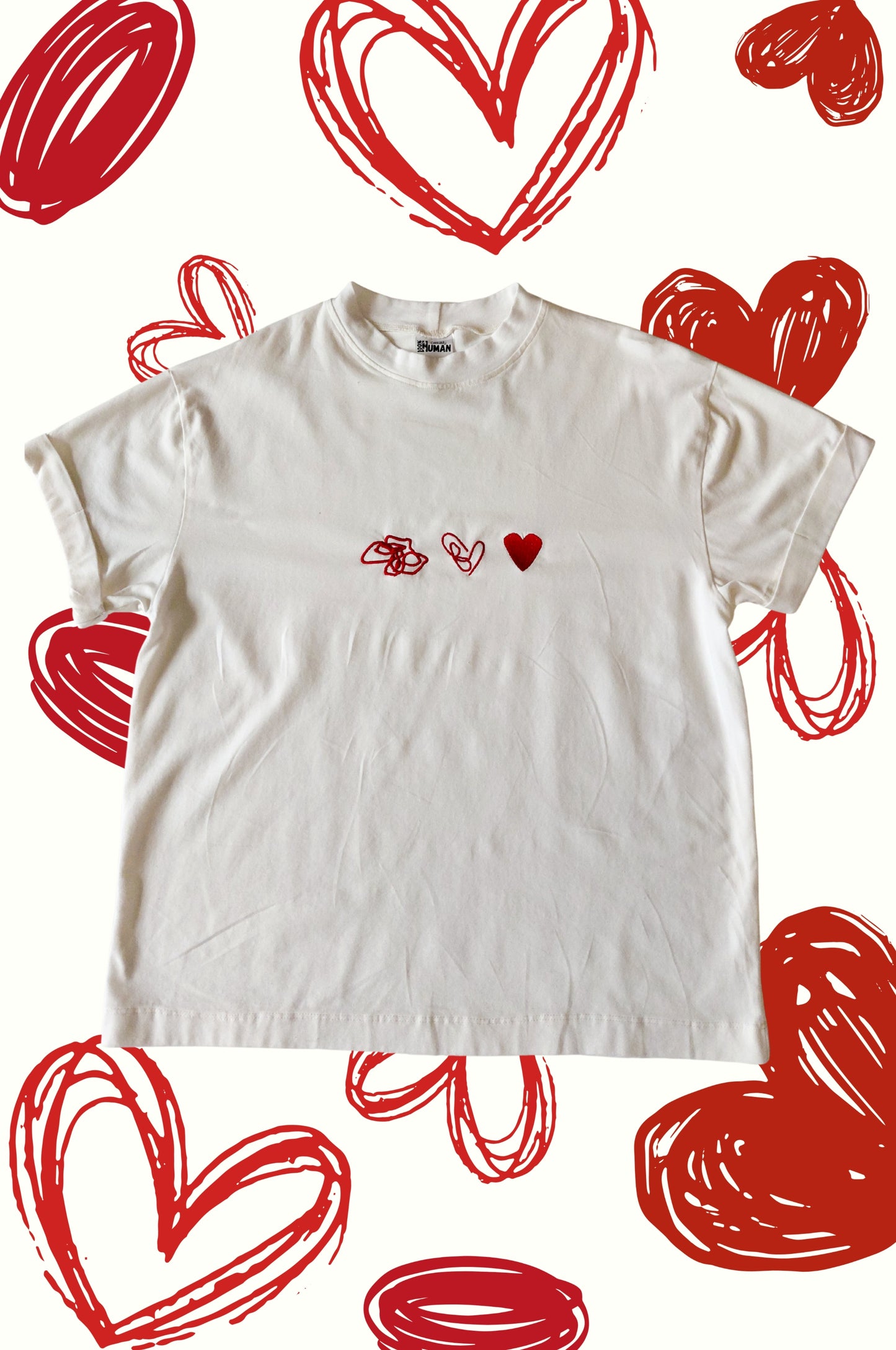 White graphic t-shirt with red heart embroidery, quirky 100% cotton tee product display with heart graphics South Africa