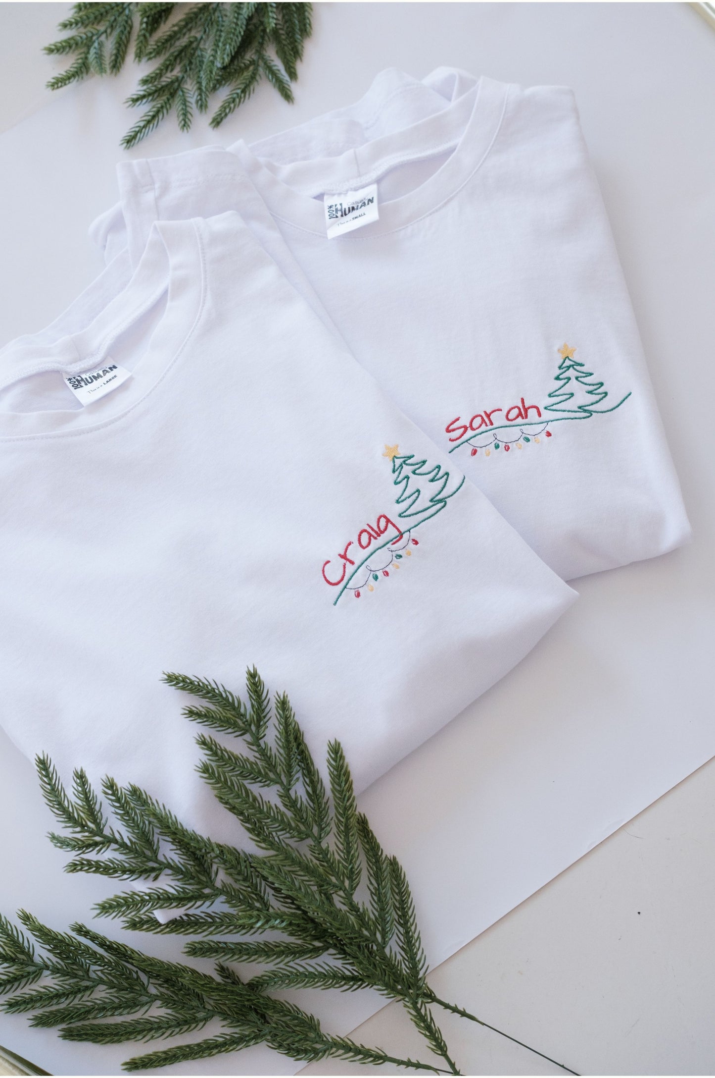 White personalised Christmas t-shirt with custom name embroidery and tree design, 100% cotton South Africa